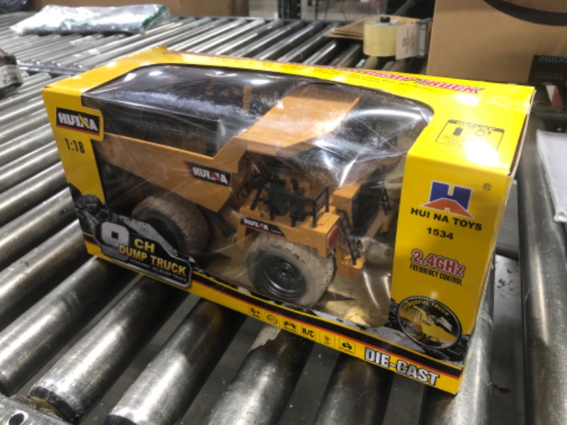 Photo 1 of Remote Control Construction Dump Truck Toy 2.4G RC 6 Channel Bulldozer 4 Wheel Driver Mine Construction Alloy Metal Vehicle Truck 1:18 with 2 Rechargeable Batteries for Boys Birthday Xmas Gift