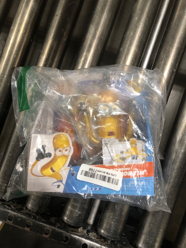 View 2 of Minions Despicable ME 4 Wild Spinning Mega Tim Action Figure | Press Down On Tim's Head for Some Wild Spinning Knock-Down Power | Collect All 5 | All Different Play Feature and Accessories