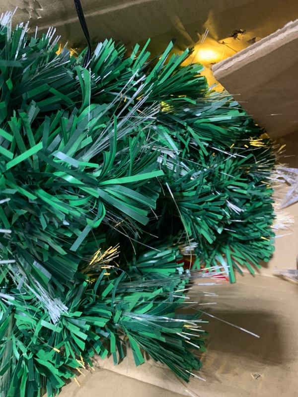 Photo 1 of Juegoal 6ft Pre-Lit Artificial Christmas Tree, Lighted Optical Fiber Xmas Trees with Warm White Large Stars & Color Changing Optical Fiber Lights, Party Home Holiday Green Fake Tree with Metal Legs