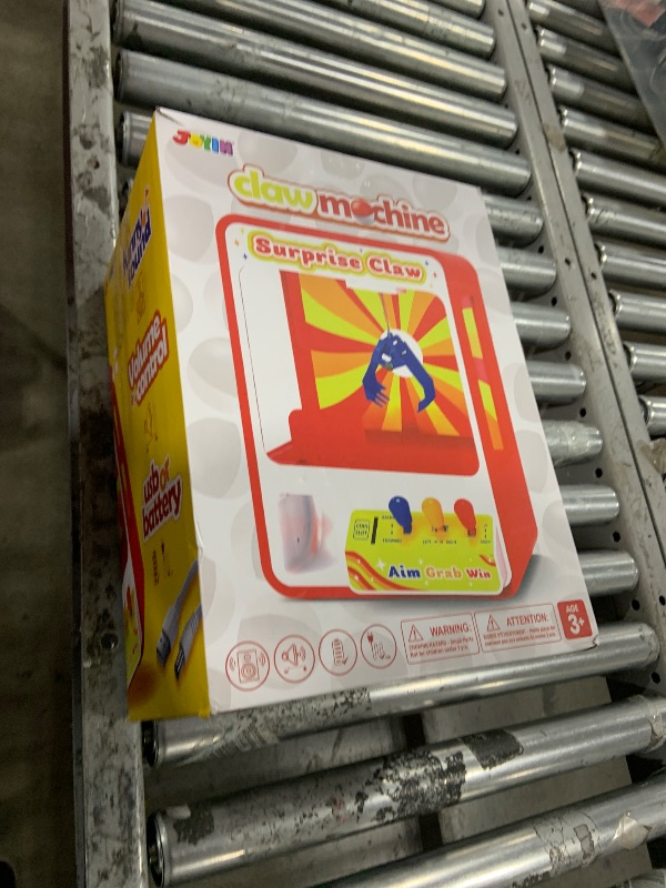 Photo 1 of JOYIN Claw Machine Arcade Toy with LED Light & Adjustable Sound, Rechargable Dispenser Toys Mini Vending Machine for Kids - Perfect Christmas & Birthday Big Gifts for Kids, Ages 3+