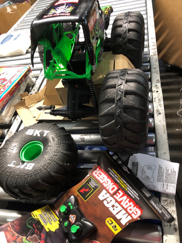 Photo 3 of **NON-REFUNDABLE, PARTS ONLY, TIRE SNAPPED OFF***
Monster Jam, Official Mega Grave Digger All-Terrain Remote Control Monster Truck, Over 2 Ft. Tall, 1:6 Scale, Kids Toys for Boys and Girls Ages 4 and Up