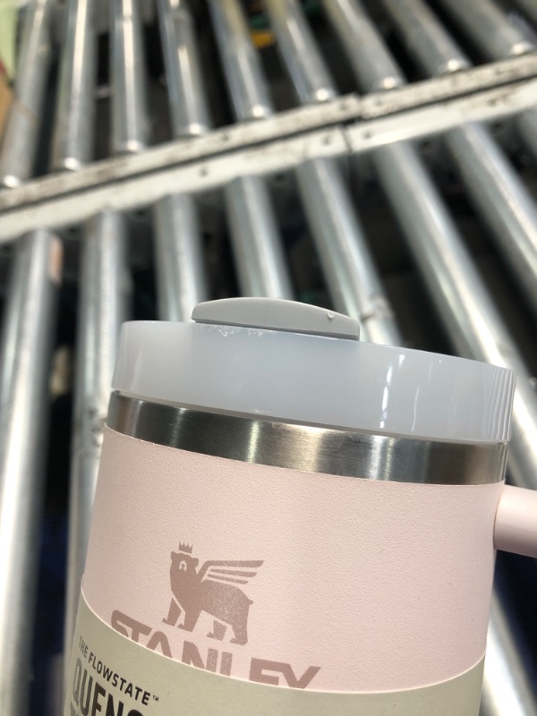 Photo 1 of **PREV USED, SOME MINOR SCUFFS AND SMALL DENTS**
Stanley Quencher H2.0 FlowState Stainless Steel Vacuum Insulated Tumbler with Lid and Straw for Water, Iced Tea or Coffee, Smoothie and More, Rose Quartz 2.0, 40 OZ / 1.18 L
