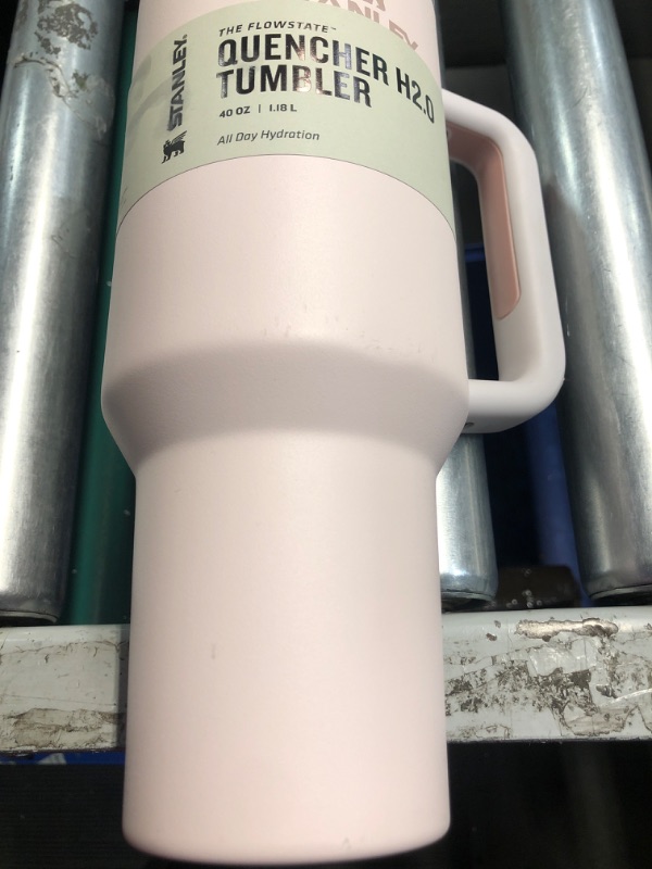 Photo 1 of **PREV USED, SOME MINOR SCUFFS AND SMALL DENTS**
Stanley Quencher H2.0 FlowState Stainless Steel Vacuum Insulated Tumbler with Lid and Straw for Water, Iced Tea or Coffee, Smoothie and More, Rose Quartz 2.0, 40 OZ / 1.18 L