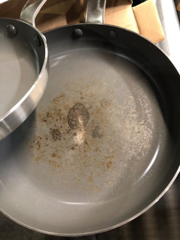 Photo 1 of **DAMAGED, LARGE FRYING PAN IS DIRTY AND POSSIBLY BURNT FOOD ON IT**
GreenPan x Bobby Flay Stainless Steel 8” & 10” Frying Pan Skillet Set, Professional Grade Tri Ply, PFAS-Free Ceramic Nonstick