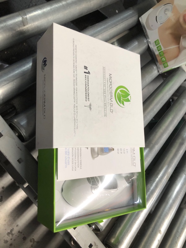 Photo 1 of **MISSING FILTER AND CHARGING BASE**
Microderm GLO Diamond Microdermabrasion Machine - Best Gift for Women - Dermabrasion & Anti Aging Wrinkle Skincare - Home Facial Treatment System - Blackhead Remover & Exfoliator for Acne Scars