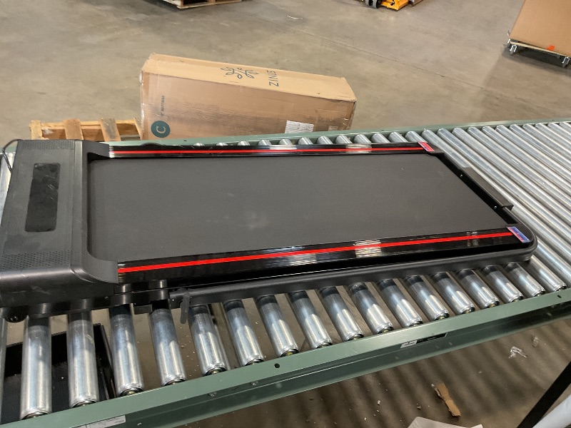 Photo 1 of Black foldable treadmill