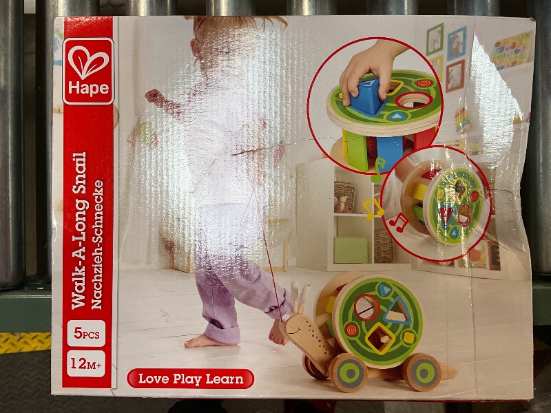 Photo 2 of Hape Walk-A-Long Snail Pull Toy |Award Winning Toddler Wooden Push and Pull Toy with Removable Color