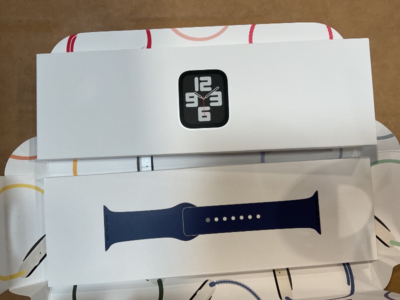 Photo 1 of Apple Watch SE (2nd Gen) [GPS 40mm] Smartwatch with Silver Aluminium Case with Denim Sport Band S/M. Fitness and Sleep Trackers, Crash Detection, Heart Rate Monitor, Retina Display