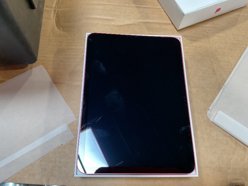 Photo 4 of *MISSING CHARGER& 
Apple iPad (10th Generation): with A14 Bionic chip, 10.9-inch Liquid Retina Display, 64GB, Wi-Fi 6, 12MP front/12MP Back Camera, Touch ID, All-Day Battery Life – Pink