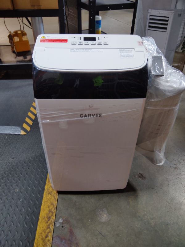 Photo 1 of ***RECOMENDED FOR PARTS/ POWERS ON/AIR DOES NOT COOL*** Garvee 14000 BTU Portable Air Conditioner with Follow Me Function, 3-in-1 AC Includes Remote & Full Window Kit, Cools Areas Up to 750 Sq. Ft, 115V