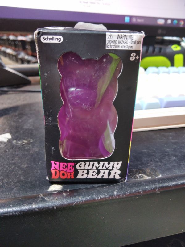 View 2 of ***MISSING INNER FILLING** Schylling NeeDoh Gummy Bear - Sensory Fidget Toy with Jelly-Like Filling - 3.5" Tall - Purple (Pack of 1)