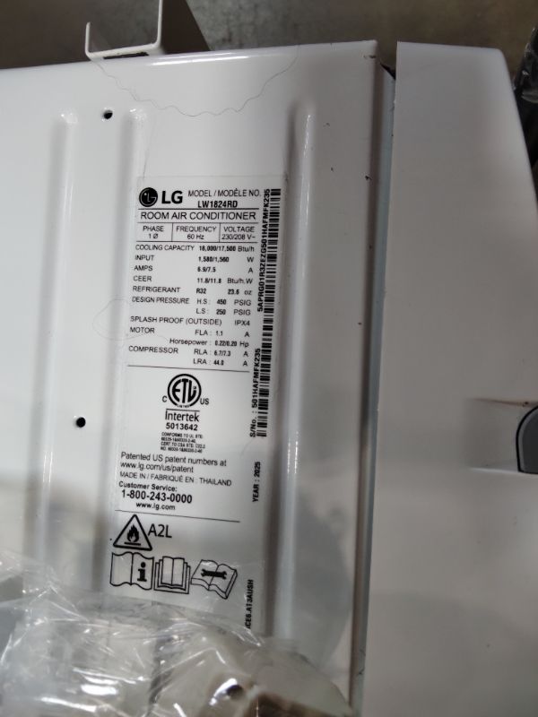 Photo 1 of ***FOR PARTS ONLY/ HAS MINOR OUTER DAMAGE/ COMPRESSOR STARTS & STOPS **** LG 18,000 BTU Window Air Conditioner, 230/208V, Cools 1,000 Sq.Ft. (25' x 40' Room Size), Quiet Operation, Electronic Control with Remote, 3 Cooling & Fan Speeds, Auto Restart, Whi