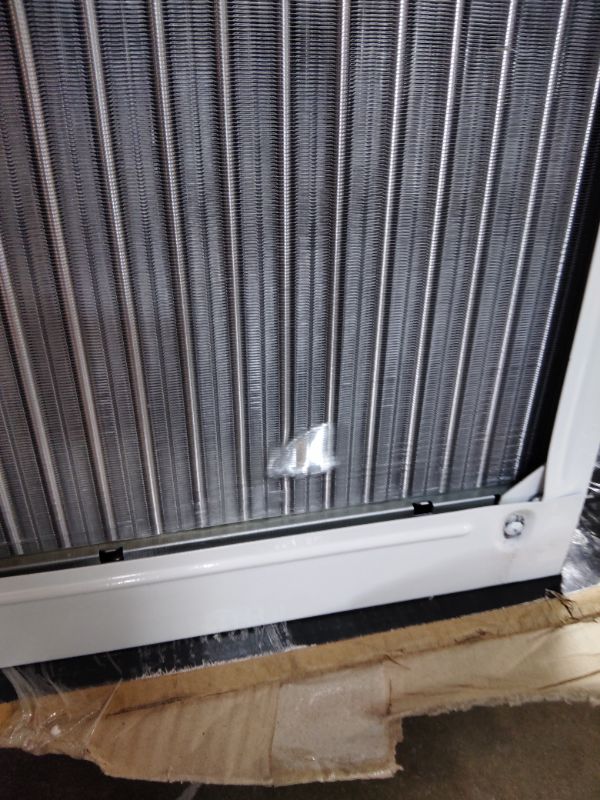 Photo 1 of ***FOR PARTS ONLY/ HAS MINOR OUTER DAMAGE/ COMPRESSOR STARTS & STOPS **** LG 18,000 BTU Window Air Conditioner, 230/208V, Cools 1,000 Sq.Ft. (25' x 40' Room Size), Quiet Operation, Electronic Control with Remote, 3 Cooling & Fan Speeds, Auto Restart, Whi