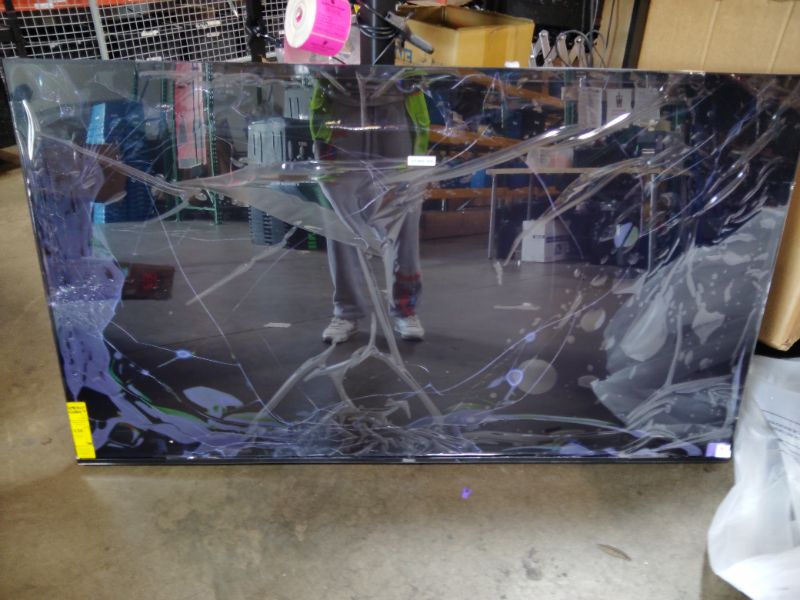 Photo 1 of ***FOR PARTS ONLY DISPLAY COMPLETLY DAMAGED*** Roku 65-Inch Smart TV - Plus Series, 4K QLED Mini-LED TV - RokuTV