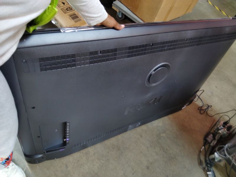 Photo 1 of ***FOR PARTS ONLY DISPLAY COMPLETLY DAMAGED*** Roku 65-Inch Smart TV - Plus Series, 4K QLED Mini-LED TV - RokuTV