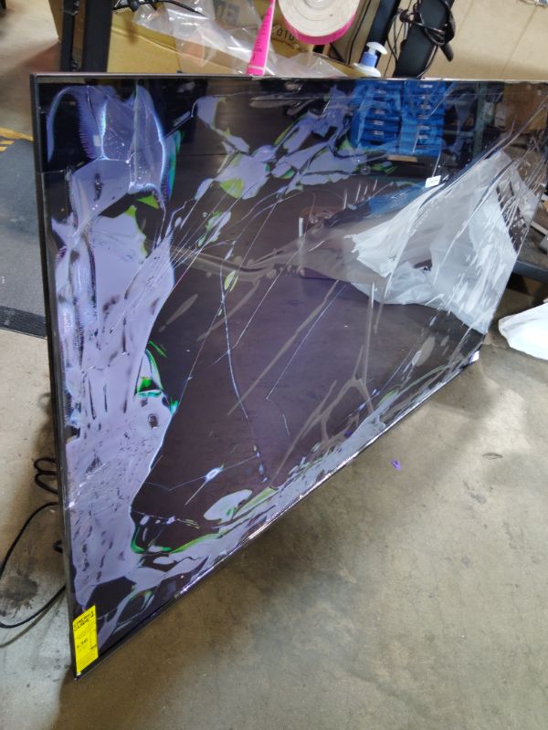 Photo 1 of ***FOR PARTS ONLY DISPLAY COMPLETLY DAMAGED*** Roku 65-Inch Smart TV - Plus Series, 4K QLED Mini-LED TV - RokuTV