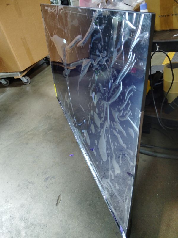 Photo 1 of ***FOR PARTS ONLY DISPLAY COMPLETLY DAMAGED*** Roku 65-Inch Smart TV - Plus Series, 4K QLED Mini-LED TV - RokuTV