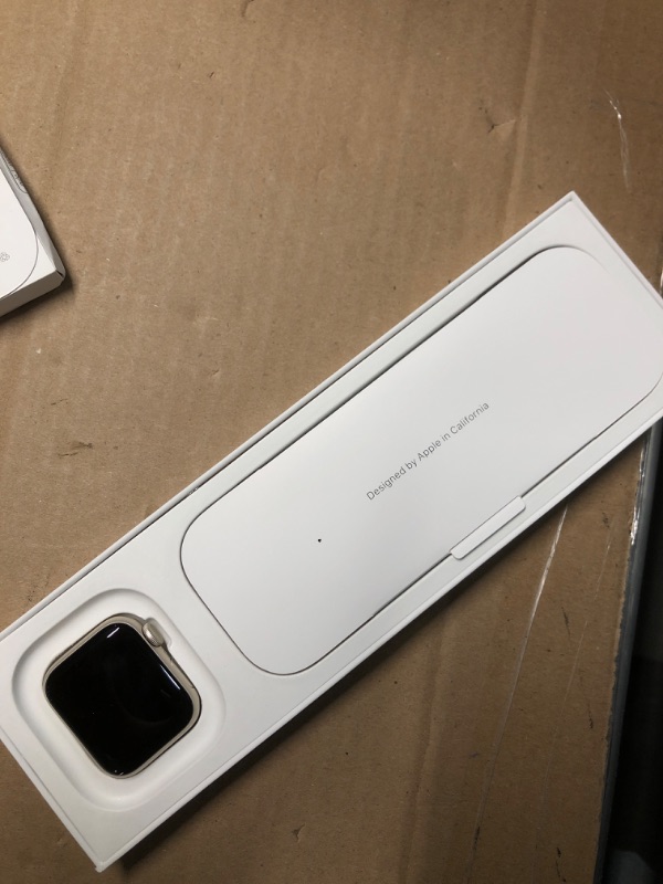 Photo 1 of Apple Watch SE (2nd Gen) [GPS 40mm] Smartwatch with Starlight Aluminum Case with Starlight Sport Band S/M. Fitness and Sleep Tracker