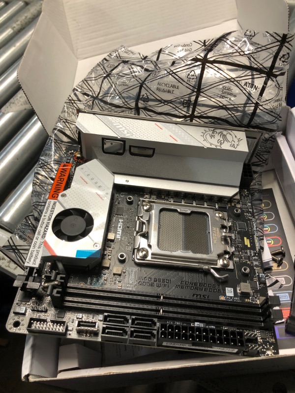 Photo 1 of  MSI MPG B650I Edge WiFi Gaming Motherboard (AMD Ryzen 9000/8000/7000 Series Processors, AM5, DDR5, PCIe 4.0, M.2, SATA 6Gb/s, USB 3.2 Gen 2, HDMI, Wi-Fi 6E, Bluetooth 5.3, 2.5Gbps LAN, Mini-ITX)