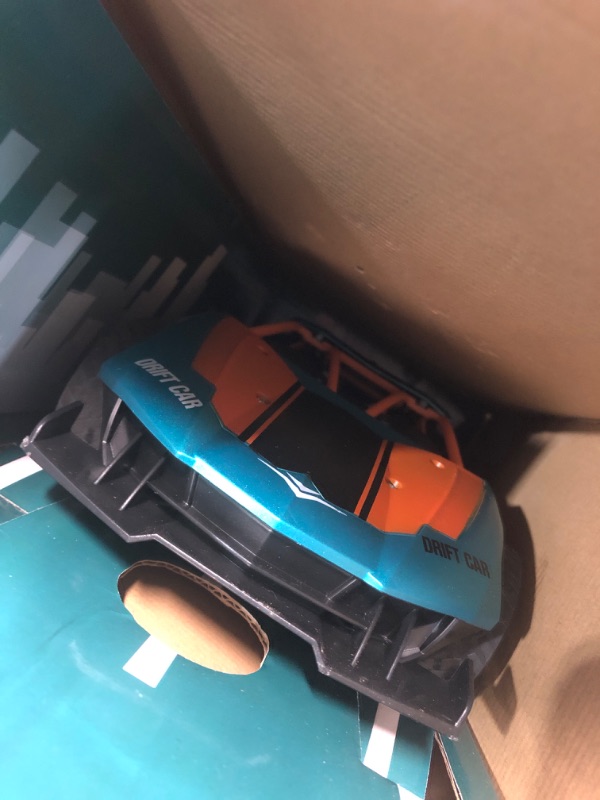 Photo 2 of ***PARTS ONLY/ JUST CAR***

Top Race RC Drift Cars - Scale Remote Control Drift Cars with Smoking Function, Li-ion Battery - Forward/Backward/Turn Left & Right -Drift RC Cars for Adults - Blue and Orange