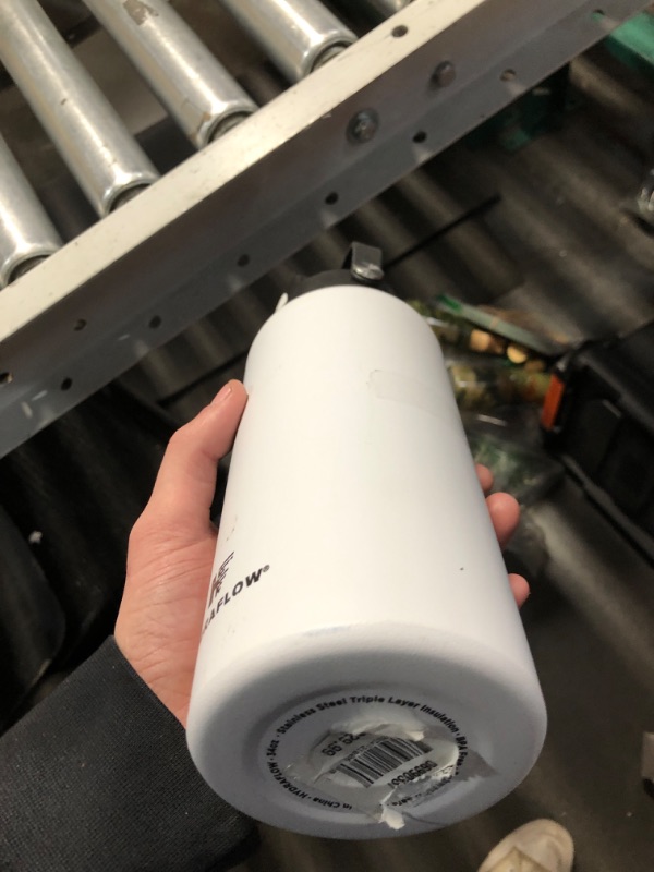 Photo 1 of light blue water bottle