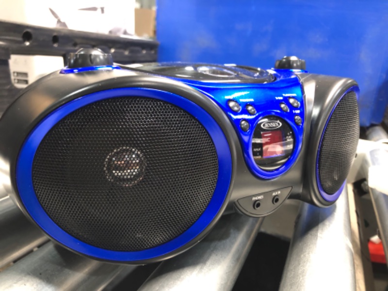 Photo 1 of **IS BLUE** Jensen CD-490 Portable Sport Stereo CD Player with AM/FM Radio and Aux Line-in and Headphone Jack 