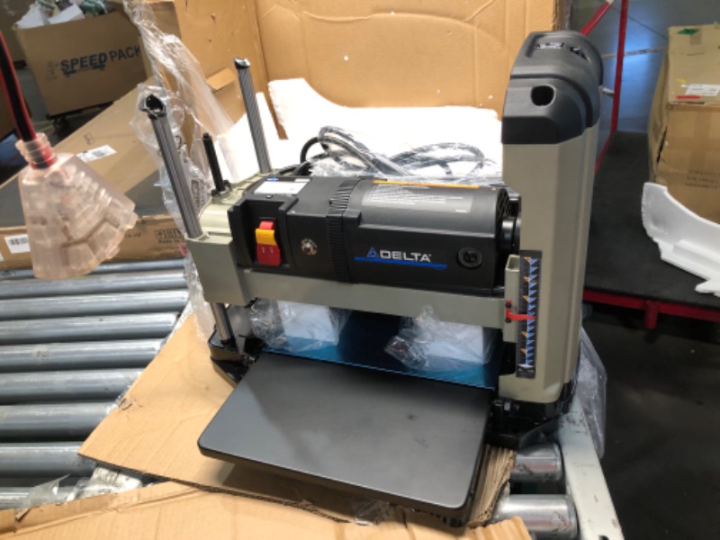 Photo 9 of ***NONREFUNDABLE - MAJOR DAMAGE - FOR PARTS ONLY - SEE COMMENTS***
Delta 15 Amp 13 in. Portable Thickness Planer, 120V, 15 Amps, 60 Hz