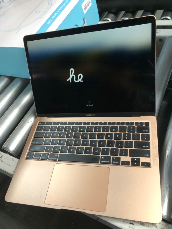 Photo 2 of **MINOR SCRATCHES ON OUTSIDE**2020 Apple MacBook Air with Apple M1 Chip (13-inch, 8GB RAM, 256GB SSD Storage) (QWERTY English) Gold (Renewed Premium)