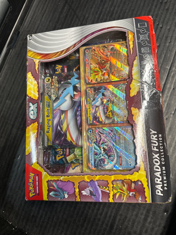 Photo 3 of ***NON REFUNDABLE/ FACTORY SEALED/ DAMAGED BOX**Pokémon TCG: Paradox Fury Premium Collection - 2024 Amazon Holiday Exclusive