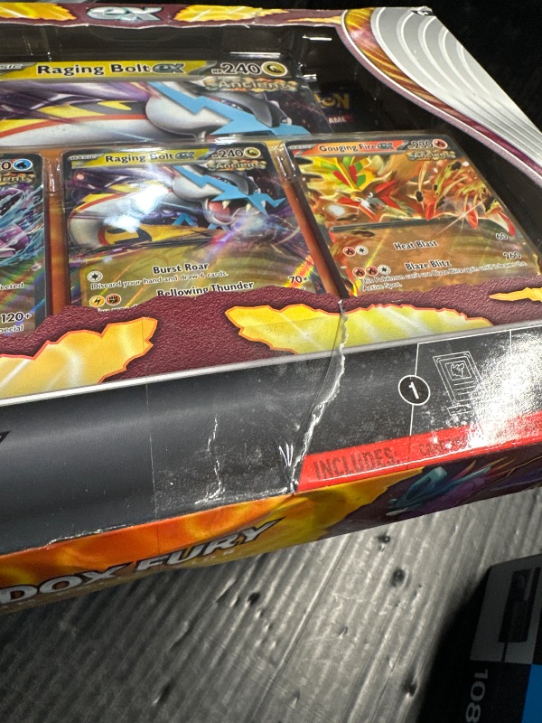 Photo 4 of ***NON REFUNDABLE/ FACTORY SEALED/ DAMAGED BOX**Pokémon TCG: Paradox Fury Premium Collection - 2024 Amazon Holiday Exclusive