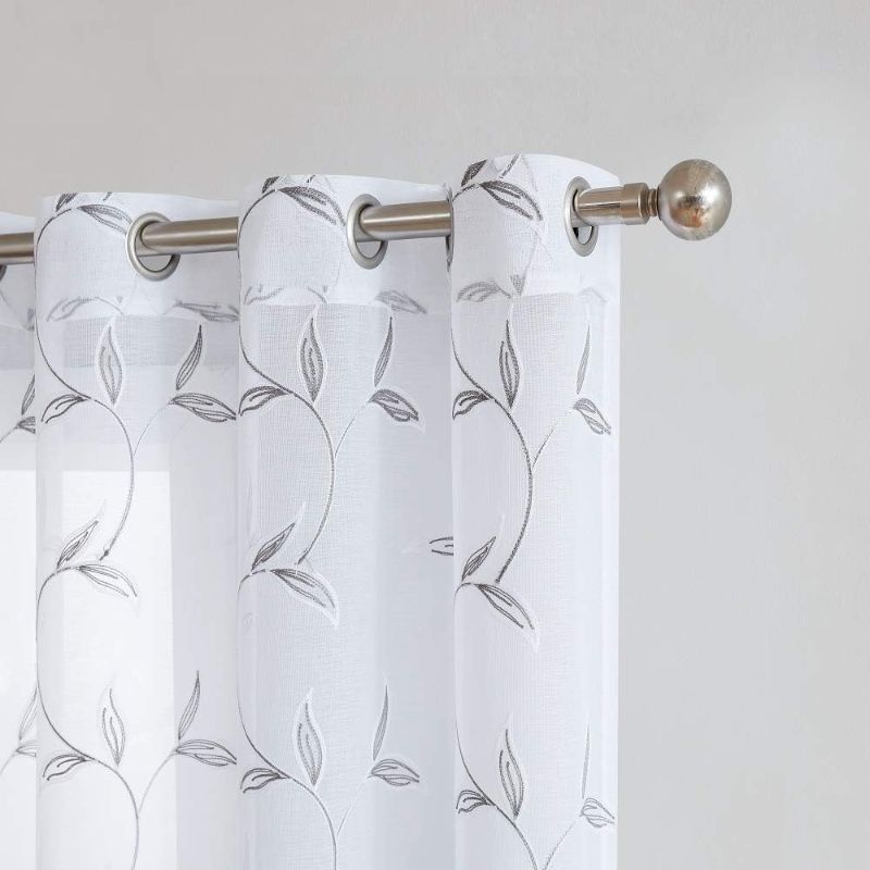 Photo 1 of *****STOCK IMAGE FOR SAMPLE***SEE NOTES*****
AT HOME Pair of 2 Sheer White Faux-Linen Standard Size Curtain Panels with Beautiful Charcoal Color Stitched Leaf Embroidery. Each Grommet Drape is 54" (Width) x 84" (Length). M Charcoal 84"