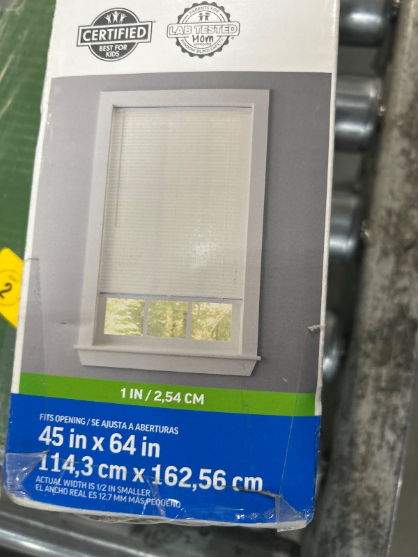 Photo 1 of 1 inch light filtering cordless vinyl mini blinds white.  