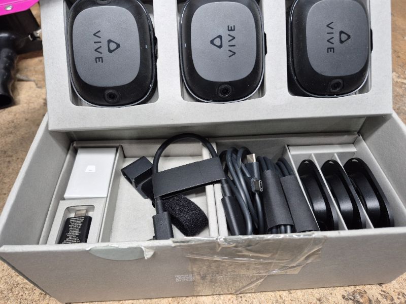 Photo 1 of HTC Vive Ultimate Tracker 3 Pack + Dongle - VR Full Body Tracking - Compatible with SteamVR, Vive XR Elite, Meta Quest Virtual Reality Headsets
