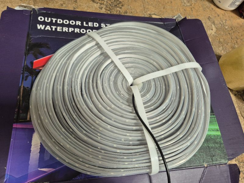 Photo 2 of ******ONE ROLL OF STRIP LIGHTS @ 150 FT. REMOTE NOT INCLUDED********
150ft Waterproof LED Strip Lights with Bluetooth App, RGB Exterior Rope Lights for Balcony, Deck, Roof, Pool - IP68, Self-Adhesive, Music Sync