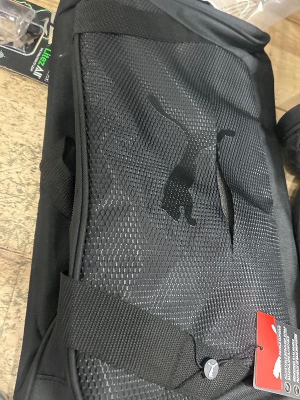 Photo 2 of **LARGE CUT ON SIDE POUCH, SEE PHOTO**
Puma Form Factor 2.0 Duffel Bag
