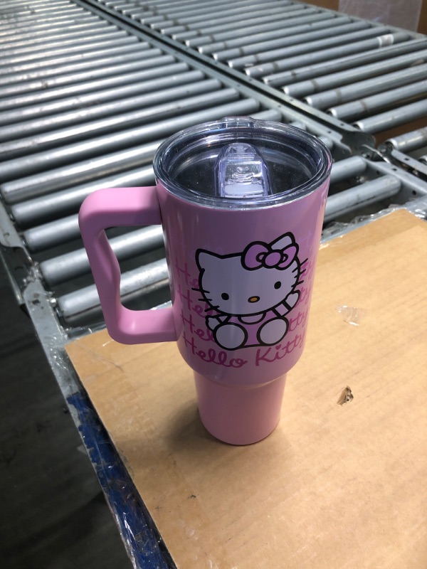 Photo 3 of ****used***Silver Buffalo Sanrio Hello Kitty Waving Stainless Steel Tumbler with Handle and Straw, Fits in Standard Cup Holder, 40 Ounces