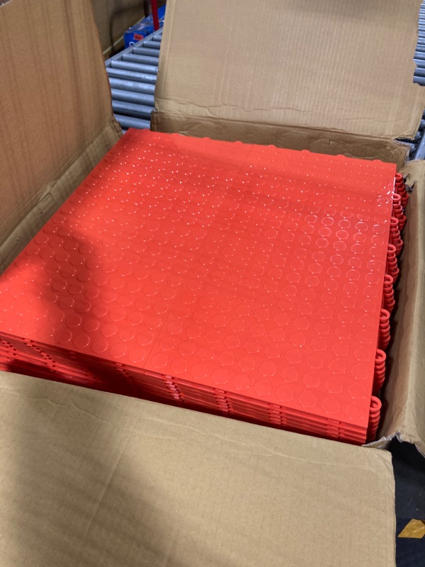 Photo 1 of ***Stock photo is a different color*** IncStores Coin Nitro Garage Tiles 12"x12" Interlocking Garage Flooring (Orange- 52-12"x12" Tiles)