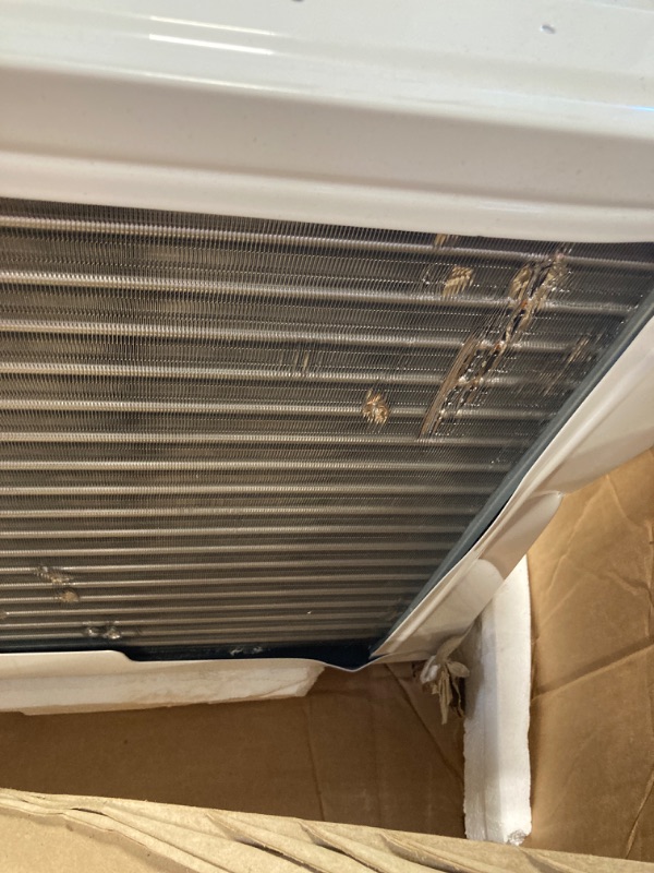 Photo 5 of ***damage shown in multiple pictures*** ***loose parts in box*** LG 18,000 BTU Window Air Conditioner with Heat, 230/208V, Cools 1,000 Sq.Ft. for Bedroom, Living Room, Basement, Apartment, with Remote, 2 Speeds, 24-Hour Timer, White Bright White 18000 BTU