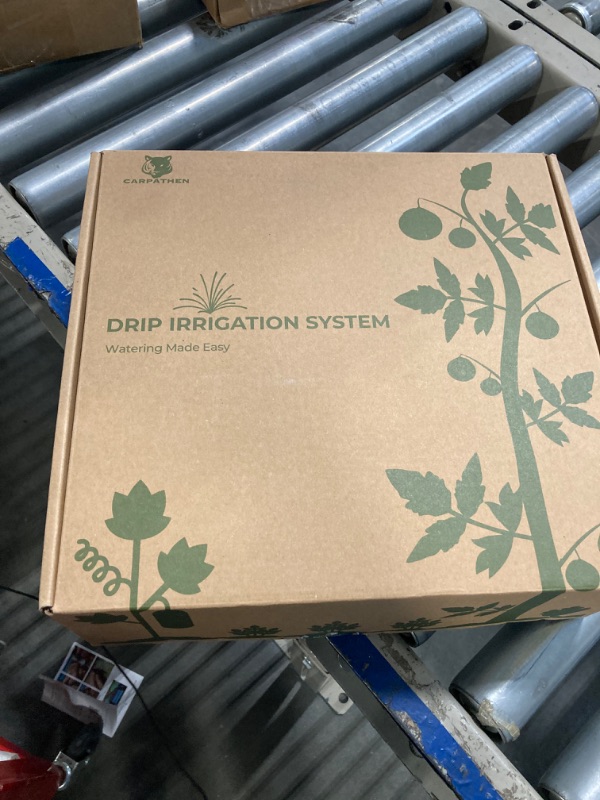 Photo 1 of CARPATHEN Drip Irrigation System - Adjustable Premium Irrigation System for Garden, Raised Beds - Complete Drip Irrigation Kit with Drip Emitters, 5/16" and 1/4" Irrigation Tubing and Barbed Fittings