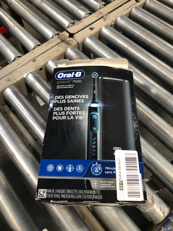 Photo 1 of ***USED***Oral B Power GENIUS 7000Electric Toothbrush, Black Onyx, iO9 Rechargeable Power Toothbrush with 4 Brush Heads and Charging Travel Case (Packaging may vary)