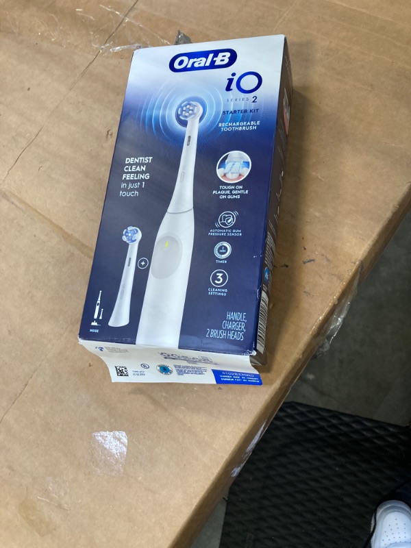 Photo 2 of ***USED***Oral-B iO Series 2 Rechargeable Electric Powered Toothbrush Starter Kit, Pure White with 2 Brush Heads - Automatic Pressure Sensor to Protect Gums - 3 Modes - 2 Min Timer