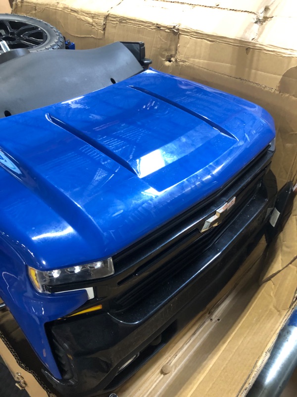 Photo 8 of ***AS IS / NO RETURNS - FINAL SALE ***/ *** It does not have a remote control and can be used by***   ReadyGO 12V Battery Powered Licensed Chevrolet Silverado Kids Ride On Truck Electric Vehicle, High Speed Mode (5 MPH), LED Lights, Retractable Tailgate, 