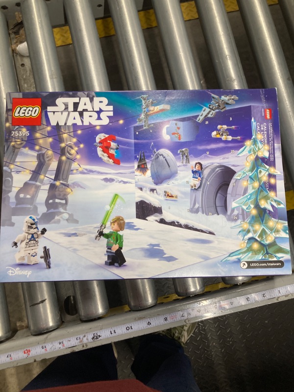 Photo 1 of LEGO Star Wars 2024 Advent Calendar for Kids, Holiday Building Set with 18 Collectible Mini Toys and 6 Star Wars Figures, Star Wars Christmas Toy for Boys, Girls or Any Fan Ages 6 and Up, 75395