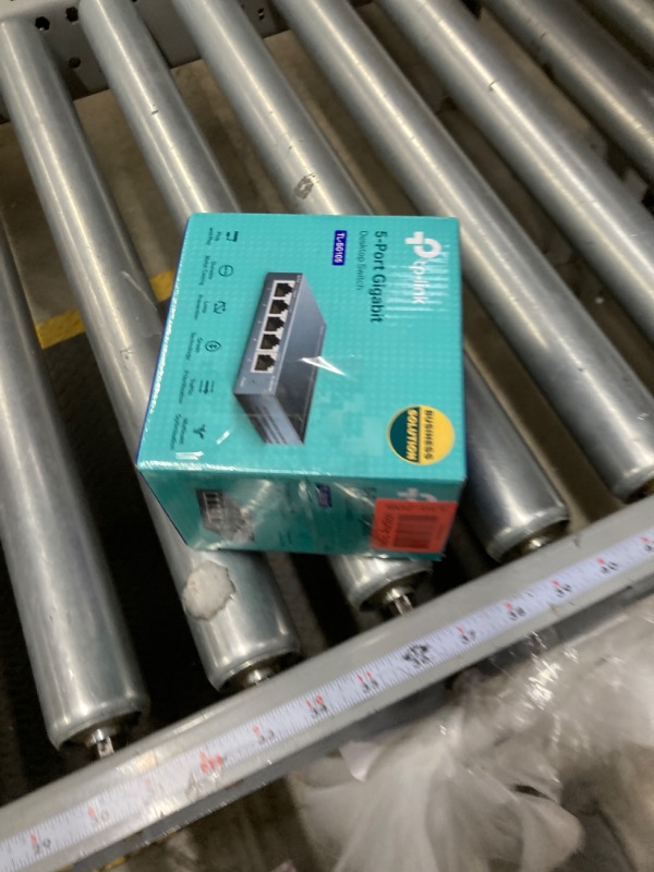 Photo 1 of TP-Link TL-SG105, 5 Port Gigabit Unmanaged Ethernet Switch, Network Hub, Ethernet Splitter, Plug & Play, Fanless Metal Design, Shielded Ports, Traffic Optimization,Navy Blue