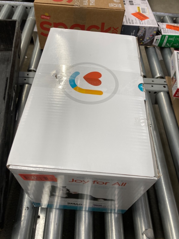 Photo 1 of JOY FOR ALL Companion Pet for Seniors - Lifelike Animatronic Cat - Realistic Soft-Touch Fur & Purring - Therapy Stuffed Animal - Toy for Alzheimer's & Dementia - Tuxedo