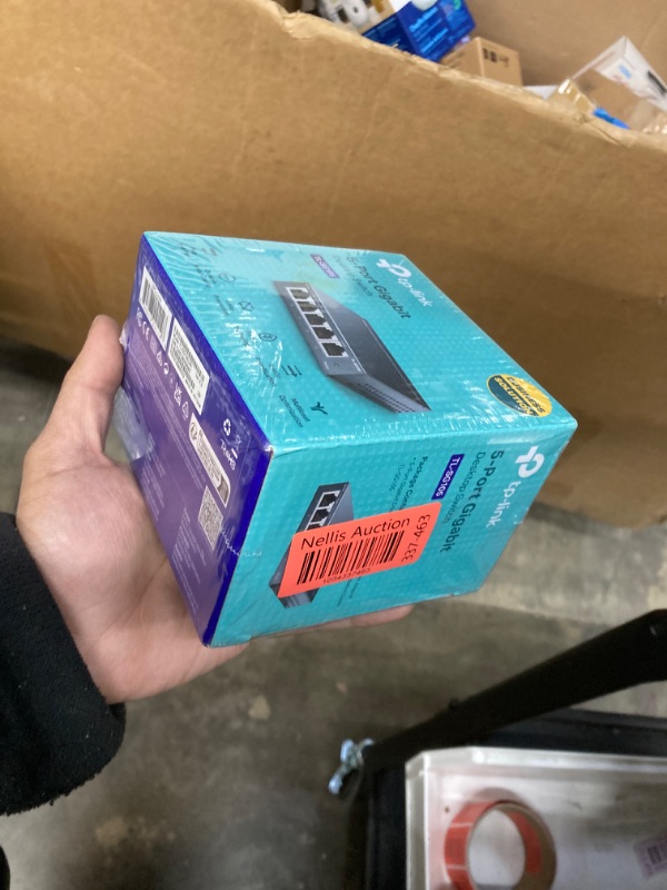 Photo 1 of TP-Link TL-SG105, 5 Port Gigabit Unmanaged Ethernet Switch, Network Hub, Ethernet Splitter, Plug & Play, Fanless Metal Design, Shielded Ports, Traffic Optimization,Navy Blue