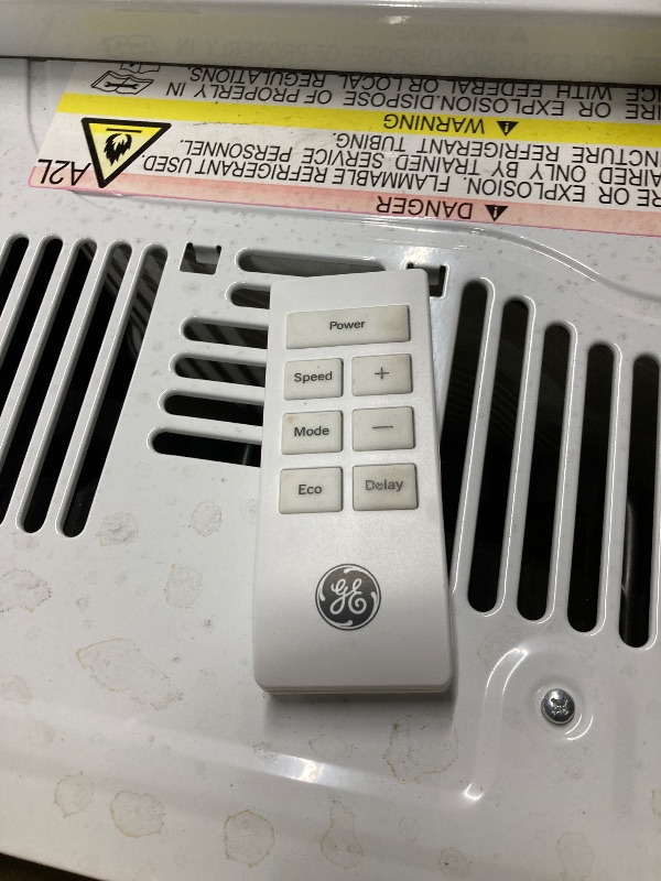 Photo 3 of ***PARTS ONLY***GE® 6,000 BTU Electronic Window Air Conditioner for Small Rooms up to 250 sq ft. ***(BOX RIPPED TORN, ITEM DIRTY.DUSTY, SOME PAINT TRANSFER,)*** 