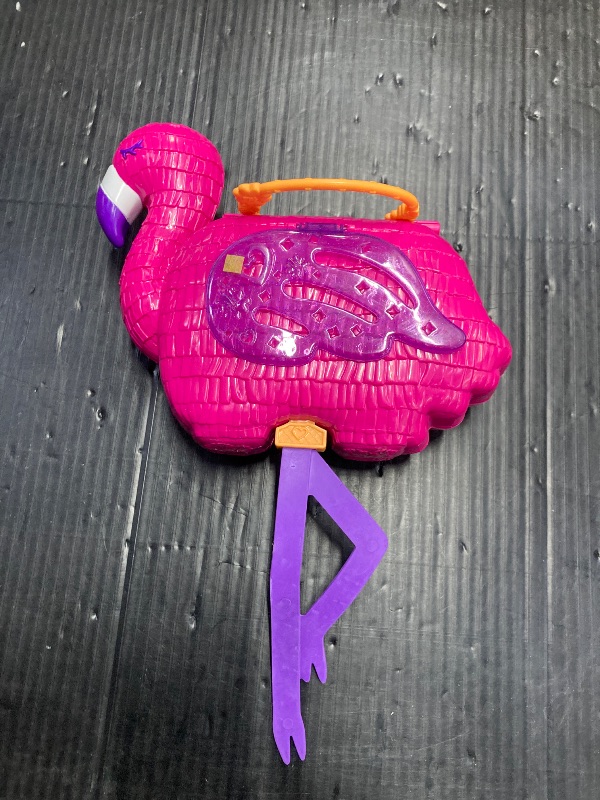 Photo 1 of Polly Pocket Travel Toy, Flamingo Party Playset with 2 Micro Dolls and 26 Surprise Accessories, Animal Toy Compact
