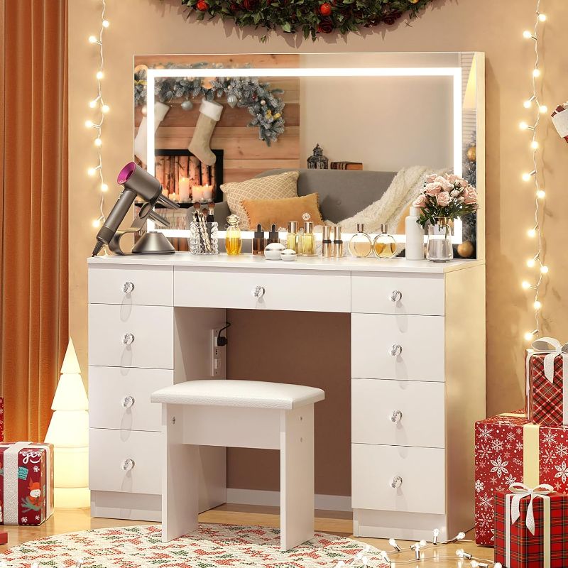 Photo 1 of ***PARTIAL SET*** VOWNER Vanity with Lighted Mirror - Makeup Vanity Desk with Power Outlet and 9 Drawers, 3 Color Lighting Modes Adjustable Brightness, 43" Vanity Table with Soft Cushioned Stool for Bedroom, White. 2 boxes, complete set.