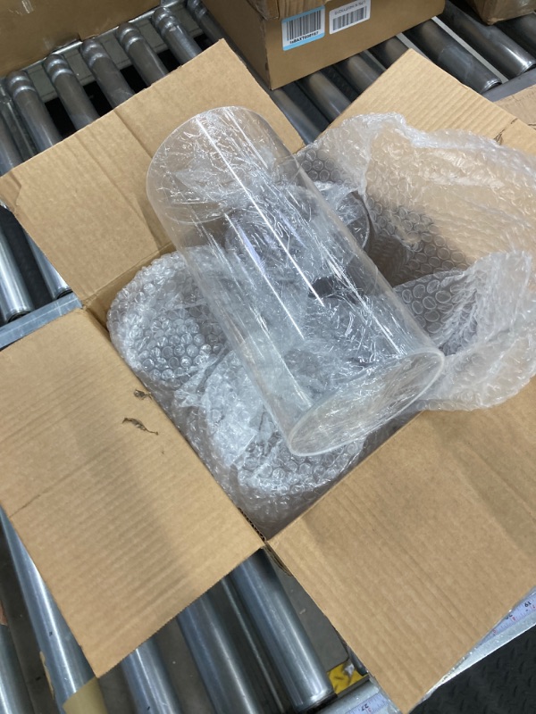 Photo 1 of 10" plastic cylinders 